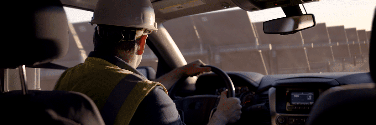 truck driving in a solar field